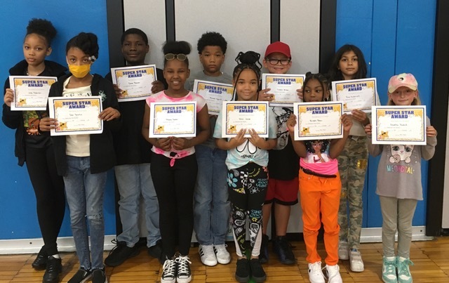 Bellview students show off award certificates
